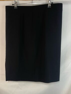 Tahari wool blend black pencil skirt. This is beautiful with a slit in the back.